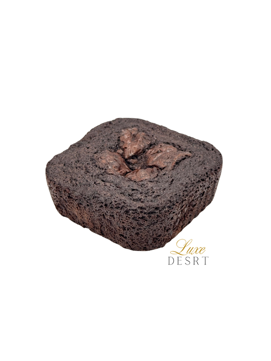 Classic chocolate brownie with fudgy center and crispy edges.