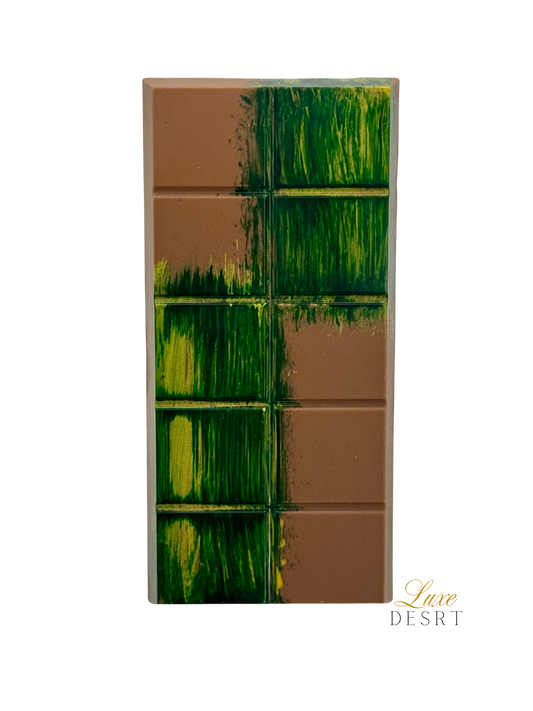 Dubai Chocolate Milk bar with Belgian chocolate, pistachio cream, caramelized kataifi, and tahini drizzle.
