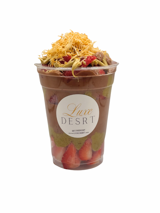 Dubai Strawberry Cup with fresh strawberries, pistachio crunch cream, and chocolate in 16oz cup.